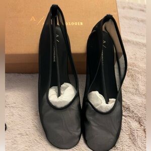 Black mesh ballet flats from Anthropologie size 9
New. Never worn.